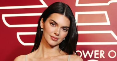 Kendall Jenner stuns in a £700 silver Reine dress during MFW