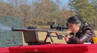 Kim Jong Un gives daughter, 13, a SNIPER RIFLE for latest photo op