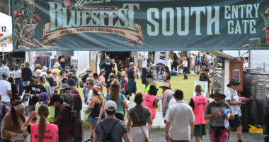 Festival visitors enter one of the main entrances during day one of the Byron Bay Bluesfest on April 14, 2022 in Byron Bay, Australia. The music festival returns after a two-year break due to the coronavirus pandemic.