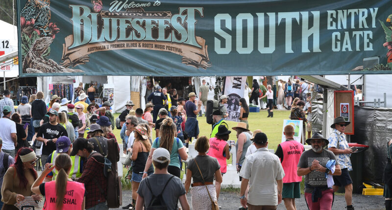 Festival visitors enter one of the main entrances during day one of the Byron Bay Bluesfest on April 14, 2022 in Byron Bay, Australia. The music festival returns after a two-year break due to the coronavirus pandemic.