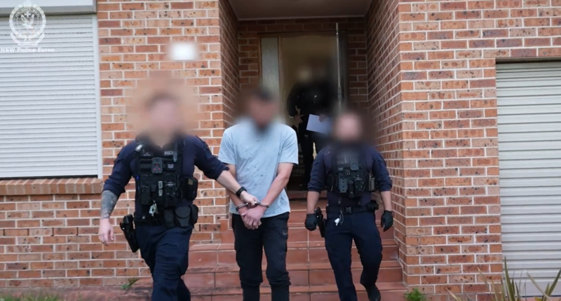 Man charged with terrorism offence after traffic stop leads to raid on Sydney home