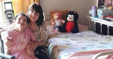 Jacqueline Schmidt Aravena, pictured with her sister at their Melbourne home.