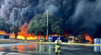 PHOTOS: ‘Sprawling’ 4-alarm blaze sparked by brush fire rips through Osceola County business