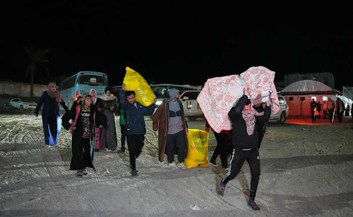 Palestinians attempt to cross between Gaza and Egypt at the Rafah border crossing