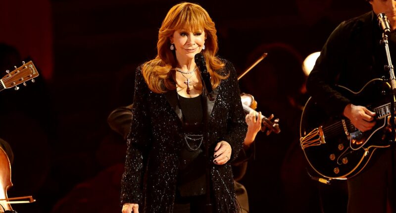 Reba McEntire's first ever Grammy Awards performance leaves viewers in tears as she delivers an emotional tribute to late stepson Brandon Blackstock during In Memoriam segment