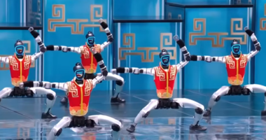 The robots at the Chinese New Year Gala performed alongside several child performers in a routine lasting almost five minutes.