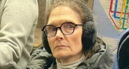 Scarface bombshell is seen on the NYC subway aged 67... who is she?