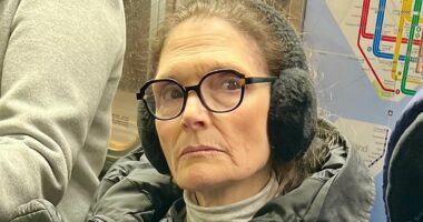Scarface bombshell is seen on the NYC subway aged 67... who is she?