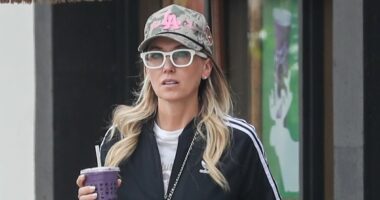 Singer divorcing producer named in Epstein files looks glum in LA