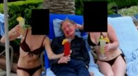Stephen Hawking poses with bikini-clad women in Epstein files photo