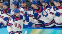 Team USA and Canada battle it out on the ice in the gold medal game for the men's hockey final