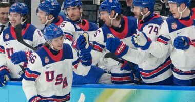 Team USA and Canada battle it out on the ice in the gold medal game for the men's hockey final