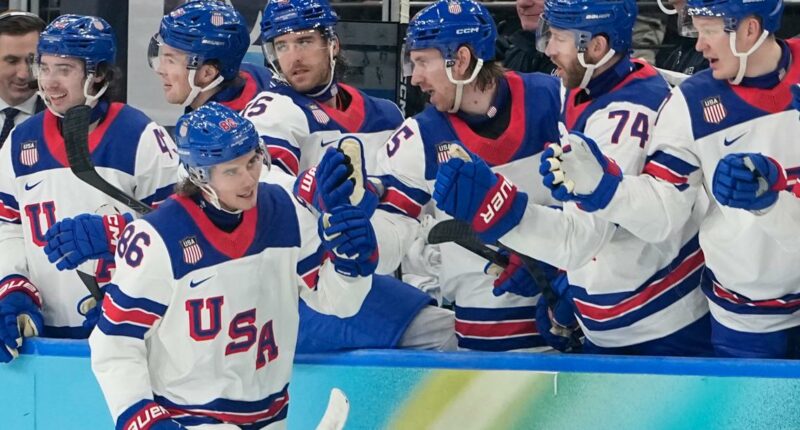 Team USA and Canada battle it out on the ice in the gold medal game for the men's hockey final