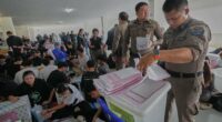 Thailand votes in early election with 3 main parties vying for power