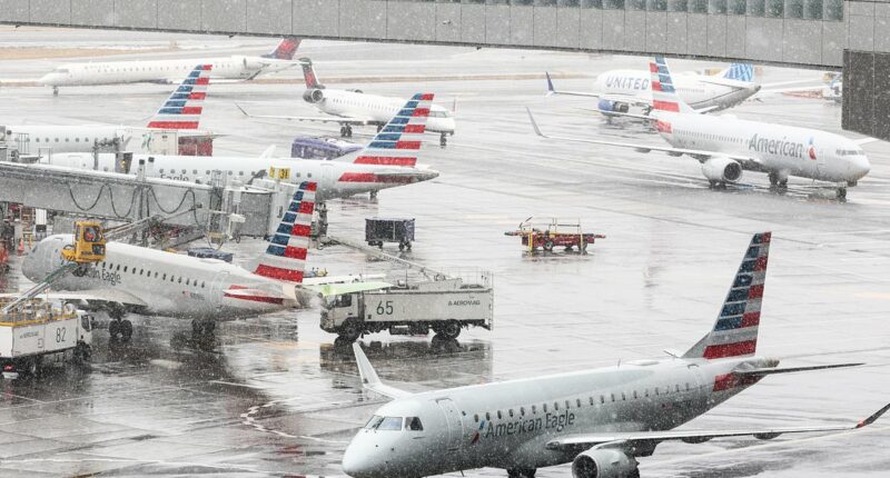 Travel chaos at NYC and Boston Airports as blizzard slams East Coast