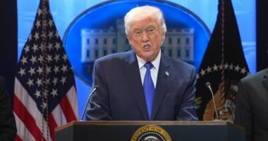 President Donald Trump speaks during a press briefing at the White House on Friday, February 20 in Washington.