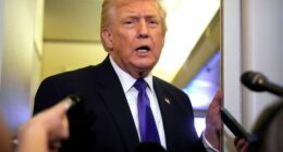 President Donald Trump speaks to reporters as he flies aboard Air Force One from Joint Base Andrews, Md., to West Palm Beach, Fla., Friday, Feb. 6, 2026 (AP Photo/Mark Schiefelbein)