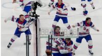 US beats Canada 2-1 in overtime to win first men's hockey championship at the Olympics since 1980