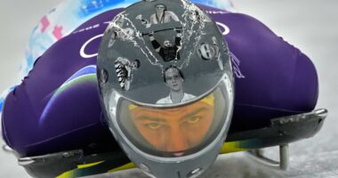 Ukrainian skeleton racer at Olympics says his helmet tribute to fallen athletes won't be allowed