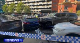 Uï»¿ndercover police have rammed a car in the middle of Melbourne after it was seen driving erratically.
