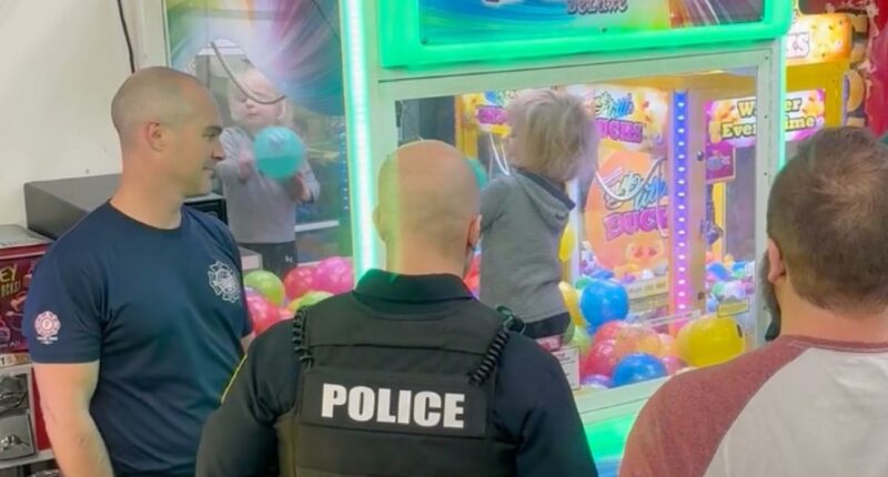 Unfazed Missouri toddler is rescued from claw machine after getting stuck inside, horrifying parents