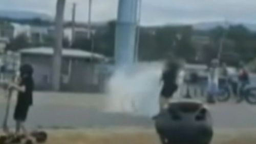 Video shows cyclist attacked by e-bike riders at Gold Coast sports ground