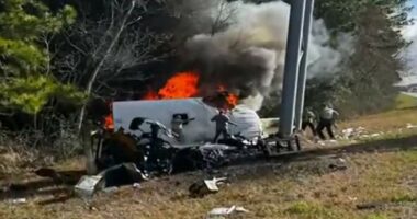Video shows prison van filled with inmates crash and catch fire