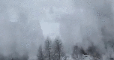Video shows terrifying moment avalanche slams into passenger train near ski resort