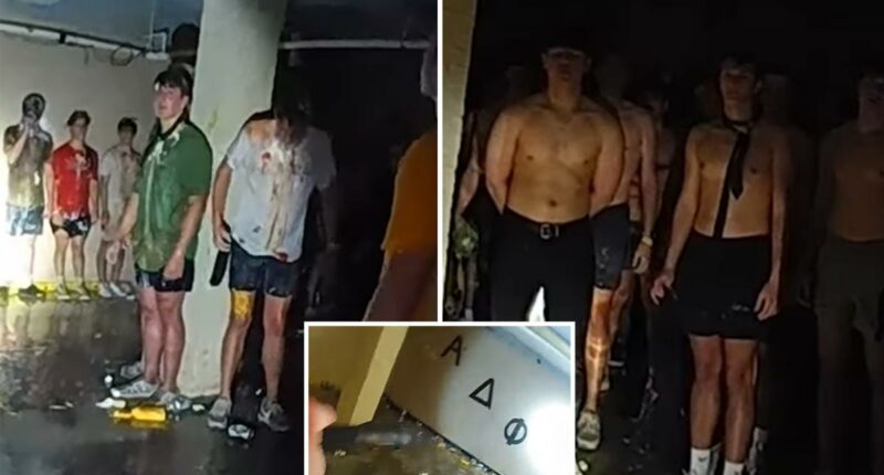 Viral disturbing bodycam footage shows dozens of shirtless, blindfolded University of Iowa pledges covered in food in frat basement