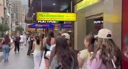 Thousands of shoppers are queuing outside MECCA on a busy Sydney street for the highly-anticipated launch of Hailey Bieber's sell-out beauty brand rhode