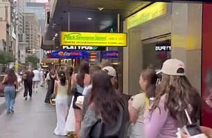 Thousands of shoppers are queuing outside MECCA on a busy Sydney street for the highly-anticipated launch of Hailey Bieber's sell-out beauty brand rhode