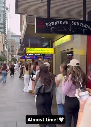 Thousands of shoppers are queuing outside MECCA on a busy Sydney street for the highly-anticipated launch of Hailey Bieber's sell-out beauty brand rhode