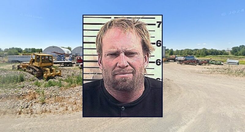 'You're not taking my tractors': Farmer threatens repo men with 12-gauge shotgun after they try to repossess his prized equipment, cops say