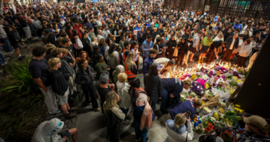 'My beautiful boy': Mother attends vigil for son allegedly murdered at station