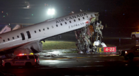 Air Canada jet hits fire truck, killing 2 and forcing New York's LaGuardia airport to close