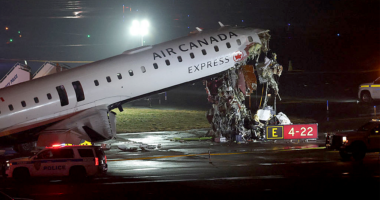 Air Canada jet hits fire truck, killing 2 and forcing New York's LaGuardia airport to close