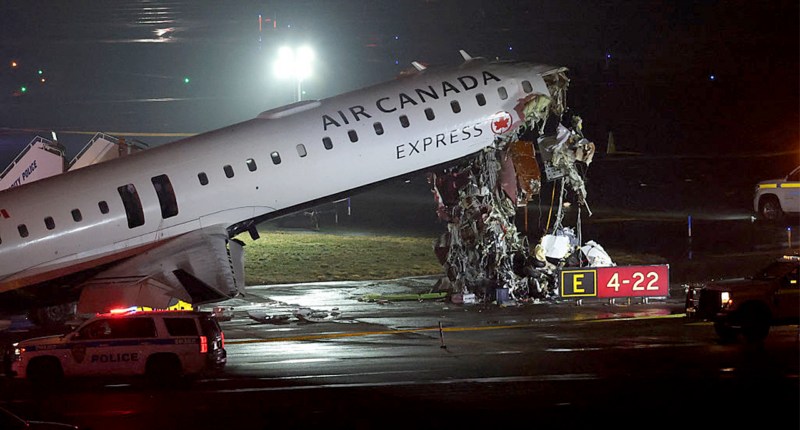 Air Canada jet hits fire truck, killing 2 and forcing New York's LaGuardia airport to close