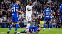 Antonio Rudiger escapes red card for 'one of the most brutal fouls ever seen' in shock Real Madrid defeat - as fans chant against Florentino Perez and ex-West Brom defender taunts Vinicius Jr
