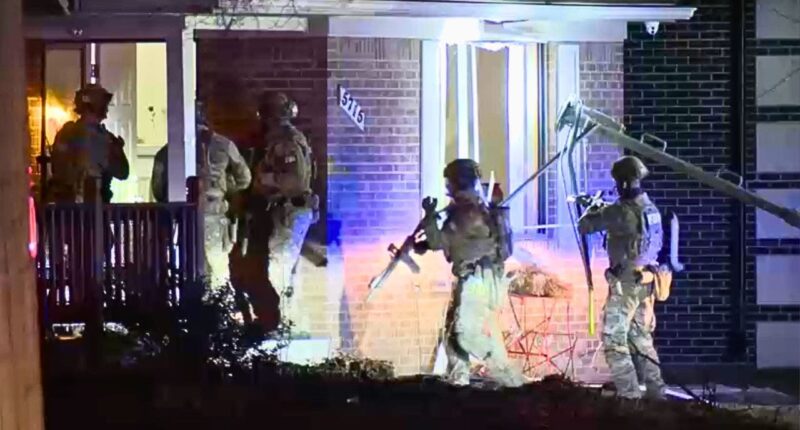 Armed FBI agents carry out search warrant believed to be in connection to synagogue attacker