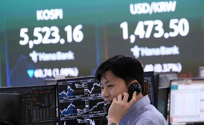 Asia shares are mixed following Wall Street's losses, as oil edges lower