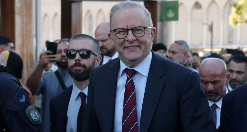 Australian prime minister heckled at mosque, called 'putrid dog' by protestors