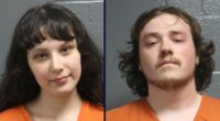 Couple arrested after toddlers found outside in extreme cold wearing only pajamas and diaper, police say
