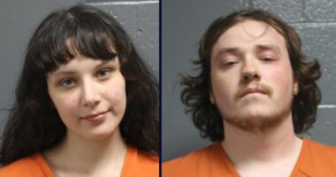 Couple arrested after toddlers found outside in extreme cold wearing only pajamas and diaper, police say