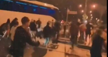 Crowds support Iran women's football team branded 'traitors' by regime