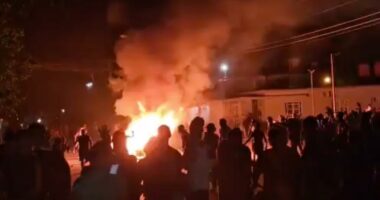 Cubans chant 'Down with Communism' and attack government building during violent night of protests