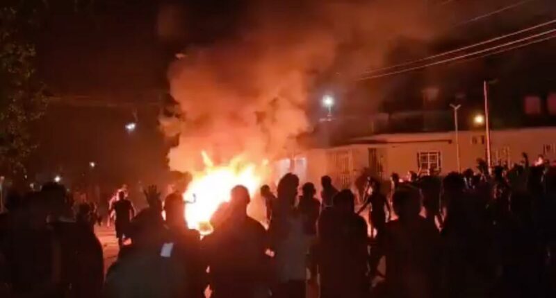 Cubans chant 'Down with Communism' and attack government building during violent night of protests