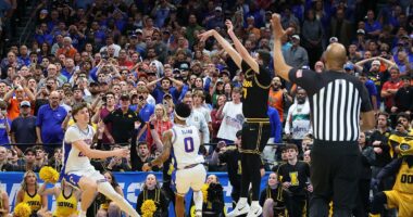 Defending champs go down in March Madness thriller after tempers flare between Iowa and top-seeded Florida