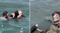 Dramatic video shows brave surf instructor jump into to action to save drowning girl