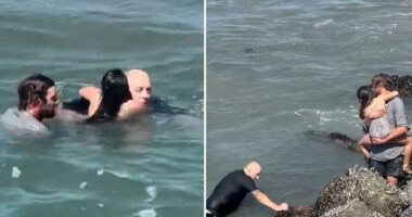 Dramatic video shows brave surf instructor jump into to action to save drowning girl