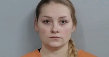Ex-Kentucky cheerleader Laken Snelling re-arrested on new manslaughter charge for suffocating her newborn â then sprung on bail